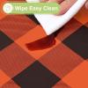 imageSmiry Round Plastic Table Cloth Waterproof Vinyl Tablecloth with Flannel Backing Wipeable Buffalo Plaid Table Cover for Dining Indoor and Outdoor Khaki ampamp White 60quot RoundOrange  Black